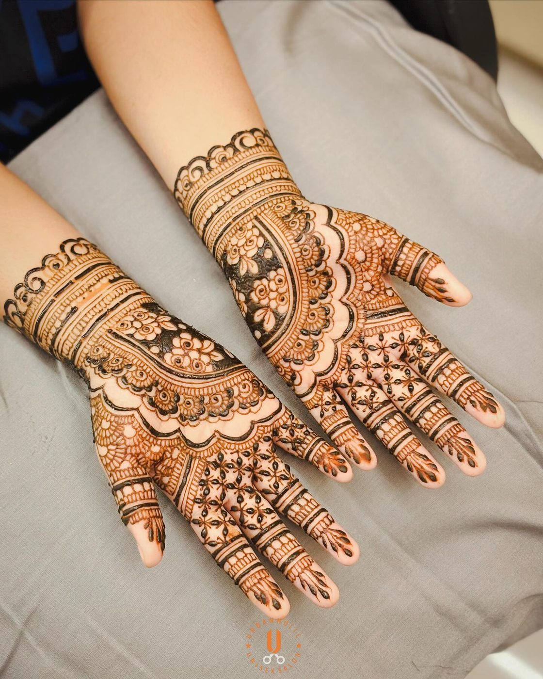 Intricate full-hand bridal mehndi