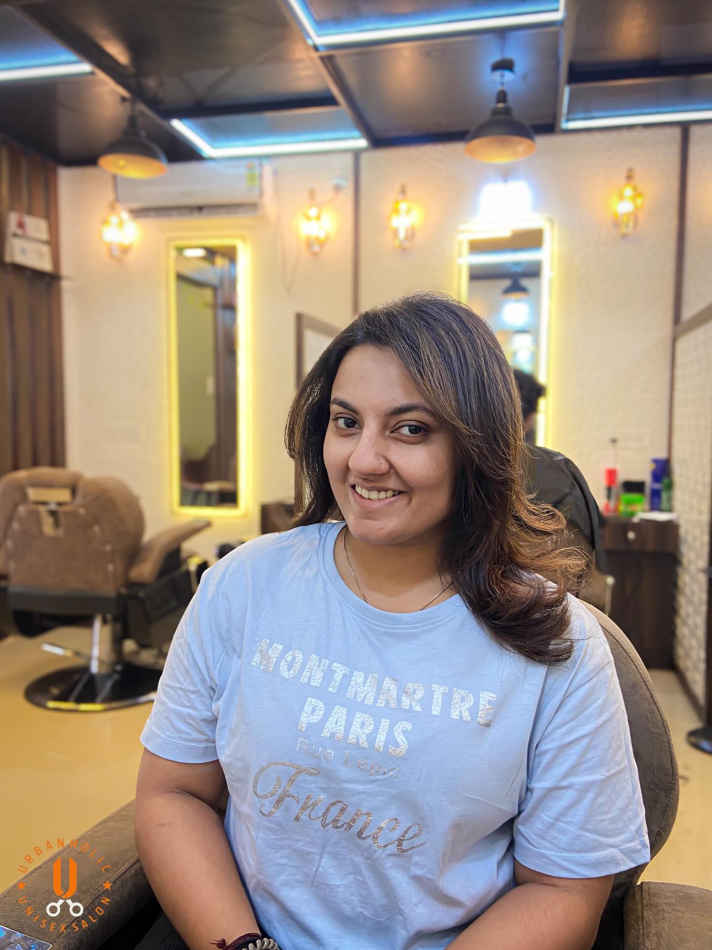 A guest after her cut at Urban Holic